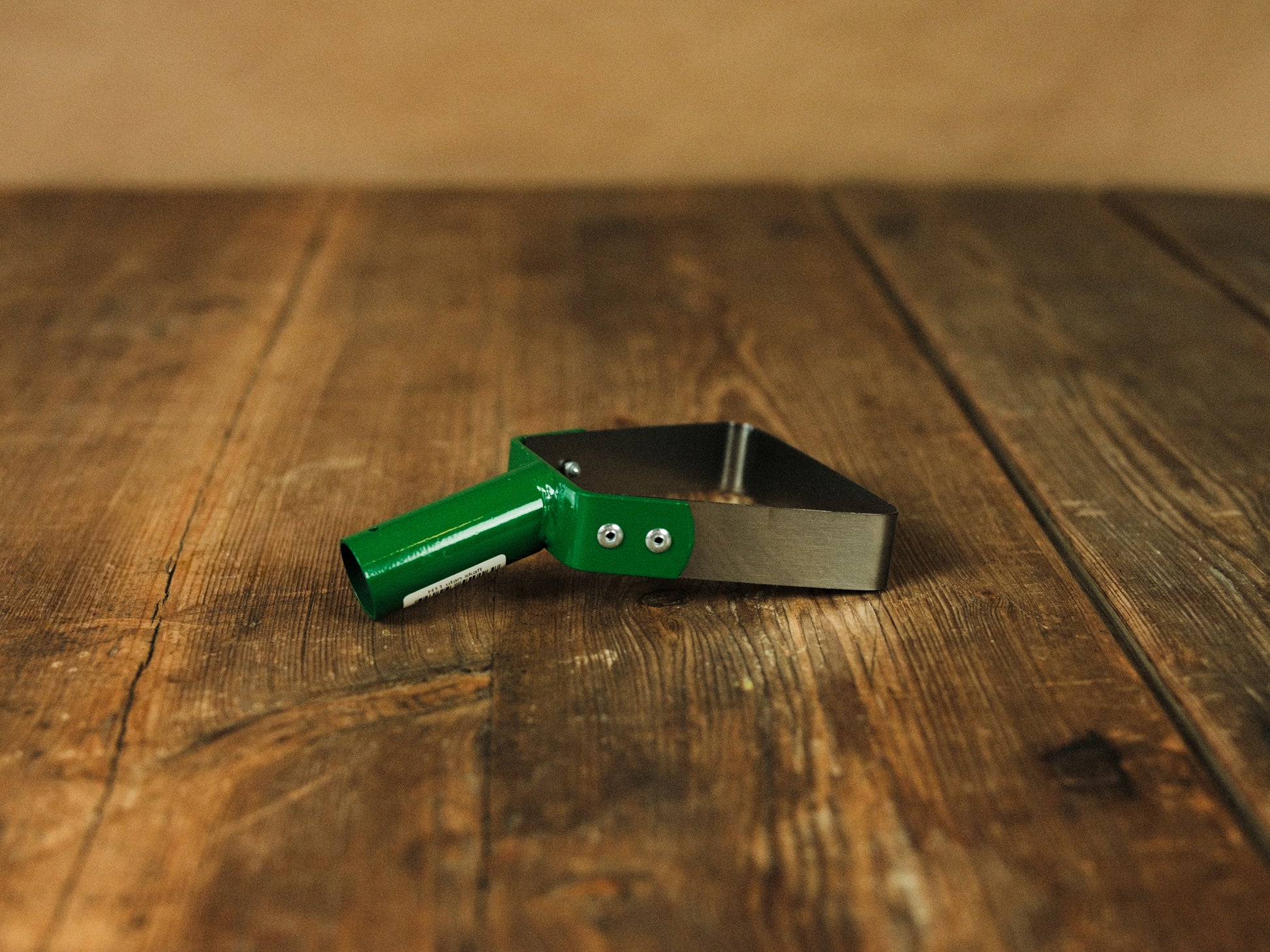 Liten bygelhacka för trädgårdsarbete